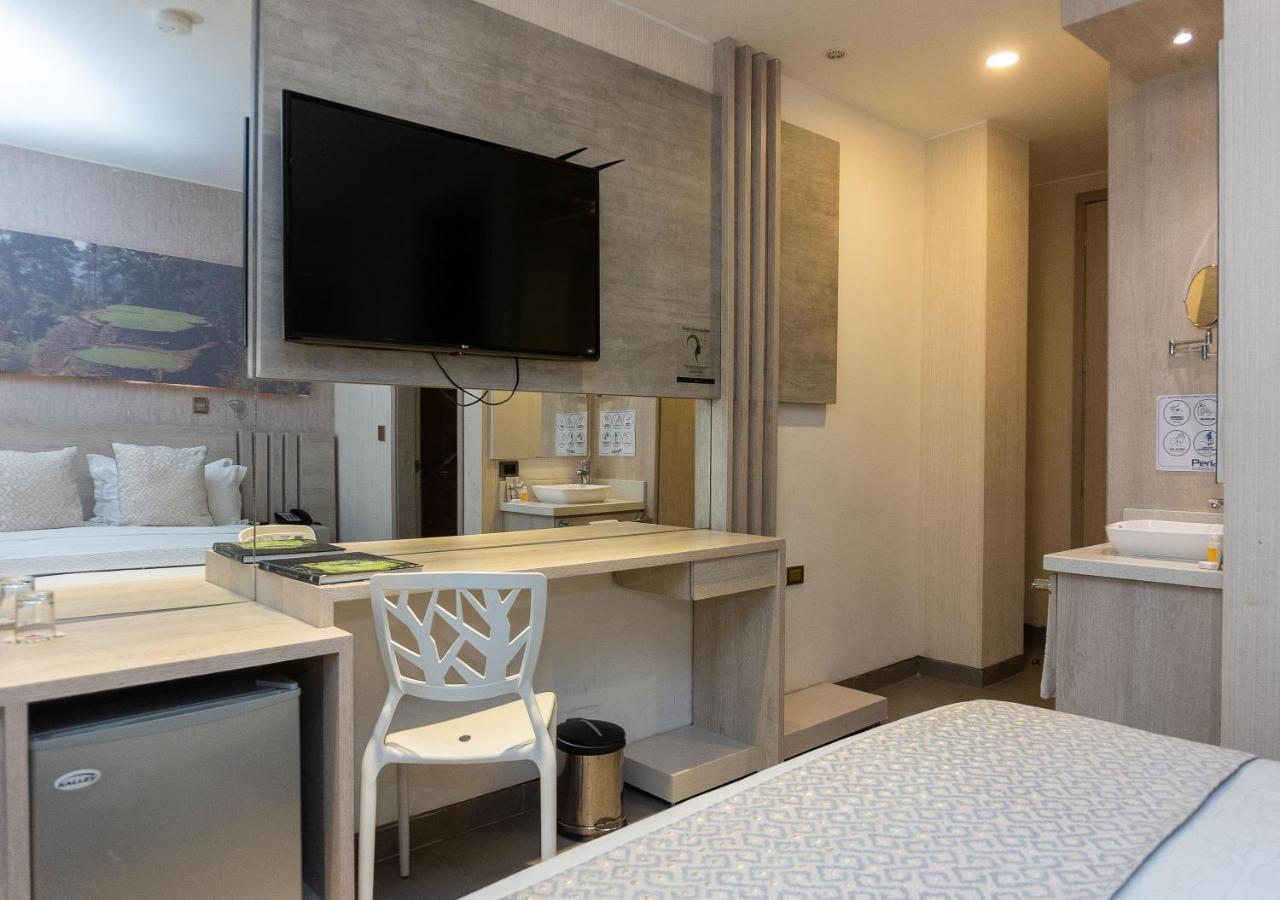 Hotel Perla Suite Santa Marta Kamer foto
