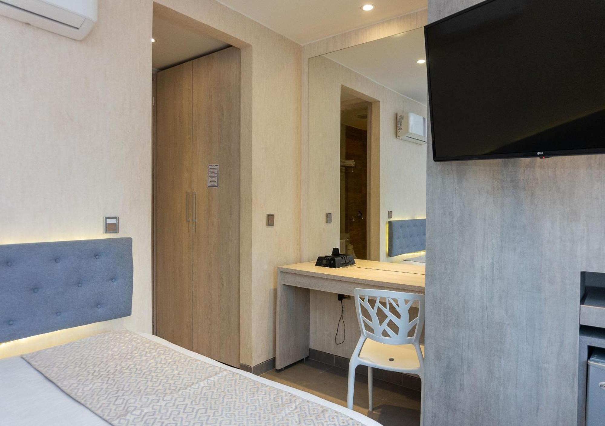 Hotel Perla Suite Santa Marta Kamer foto